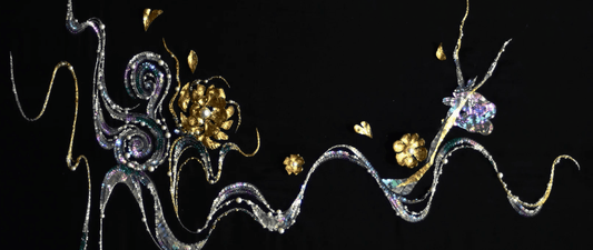 Close-up of handcrafted Chinese filigree jewelry, reflecting traditional craftsmanship, ethical artistry, and cultural heritage.