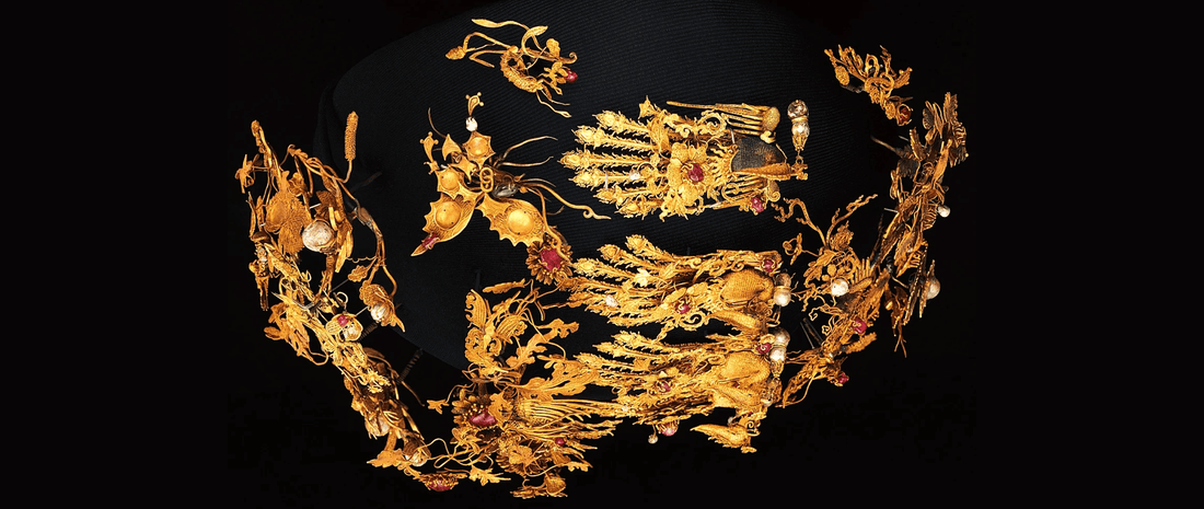 Chinese gilded phoenix crown from the Ming dynasty, showcasing intricate filigree craftsmanship, heritage-inspired gold wire patterns, and cultural symbolism