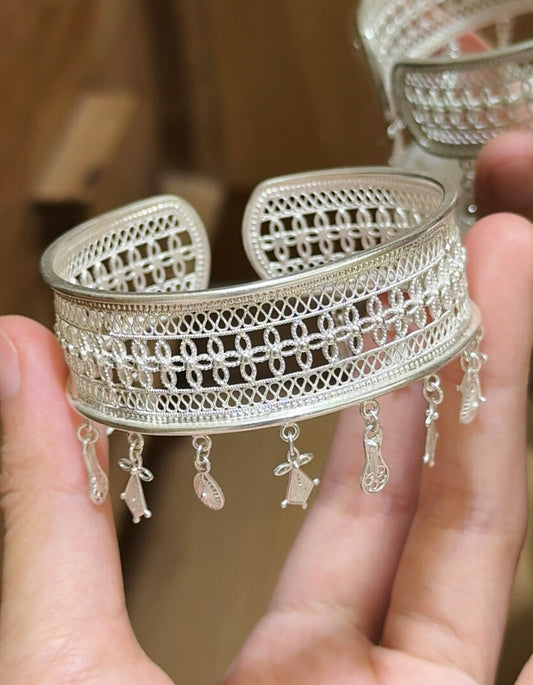 Handcrafted pure silver filigree tassel bracelet, detailed view of traditional Chinese filigree silverwork craftsmanship
