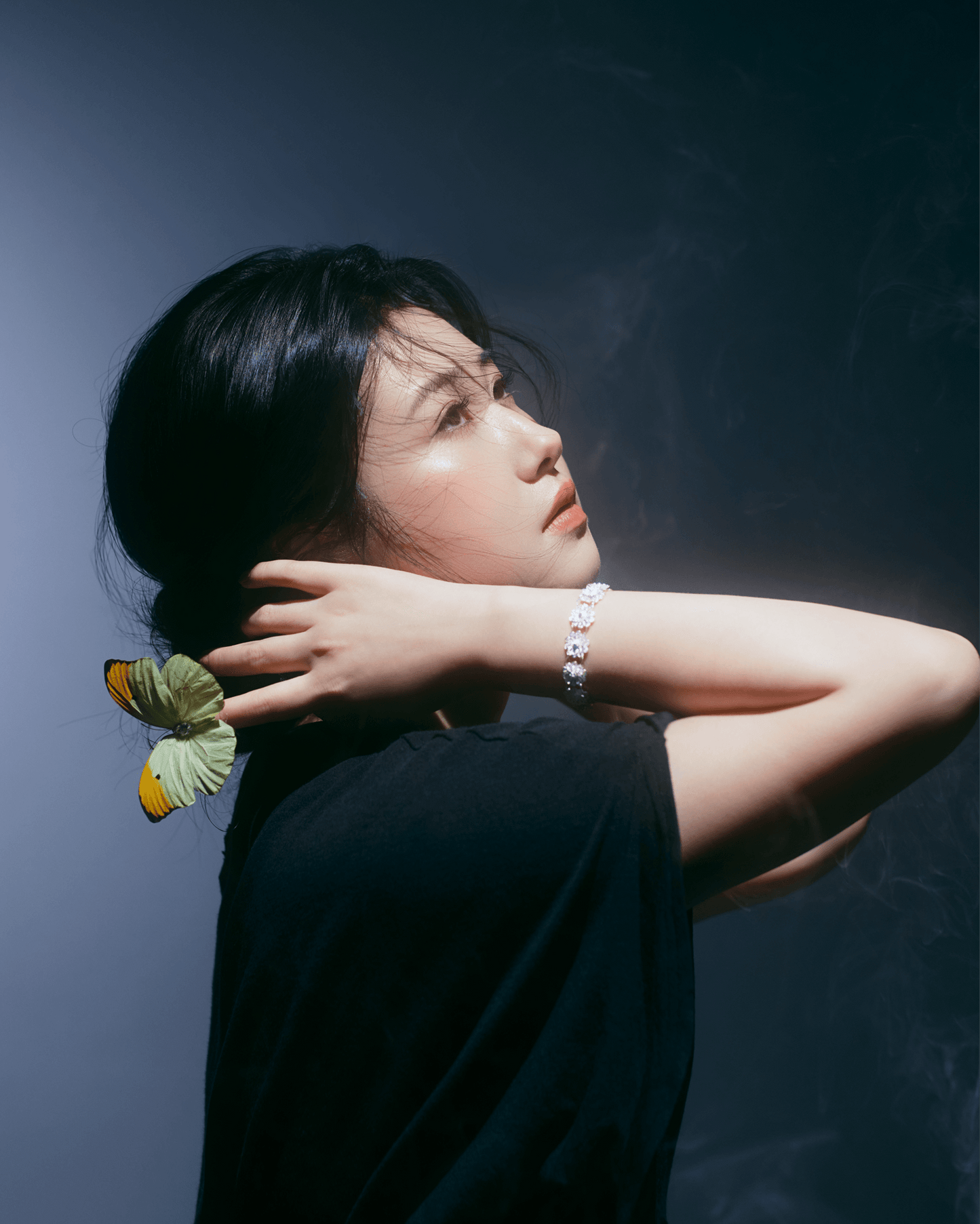 Model wearing Double Lotus Chinese Filigree Sterling Silver Bracelet, showcasing elegant layered lotus design