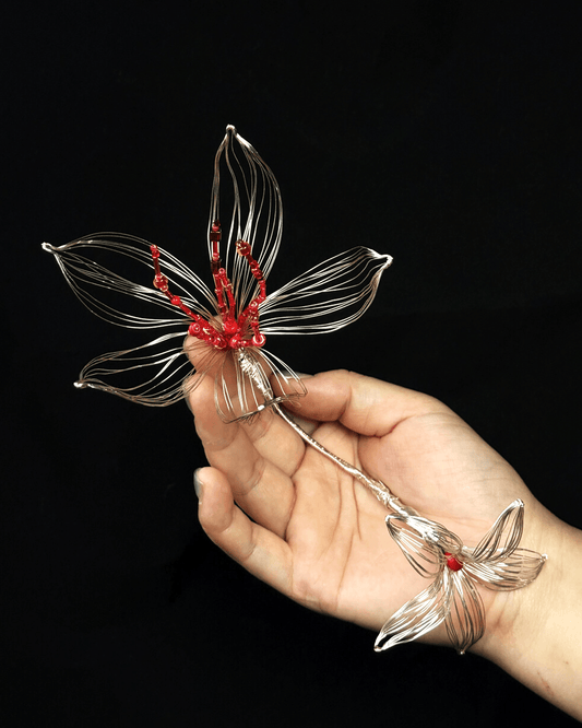 Convertible design shown as bridal hair crown and minimalist bangle bracelet on neutral background