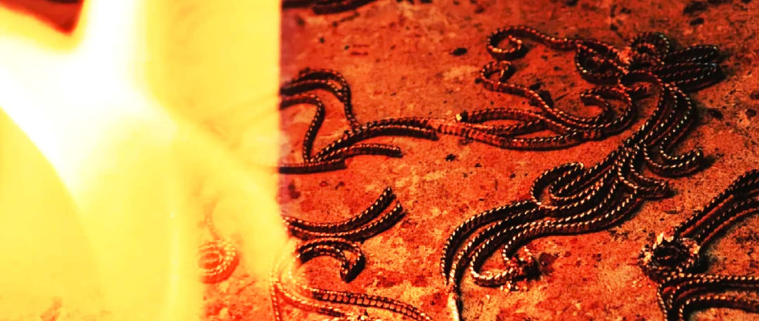 Detailed comparison of Huasi Xiangqian handmade filigree vs industrial casting jewelry, showcasing authentic Chinese heritage craftsmanship