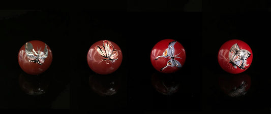 Elegant butterfly stud earrings hand-painted with traditional Chinese lacquer, showcasing vibrant colors and intricate craftsmanship.