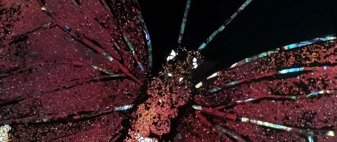 Butterfly motif created with traditional Chinese lacquer painting techniques, showing layered colors and delicate texture