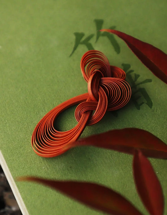 Close-up of handcrafted bamboo-woven earrings
