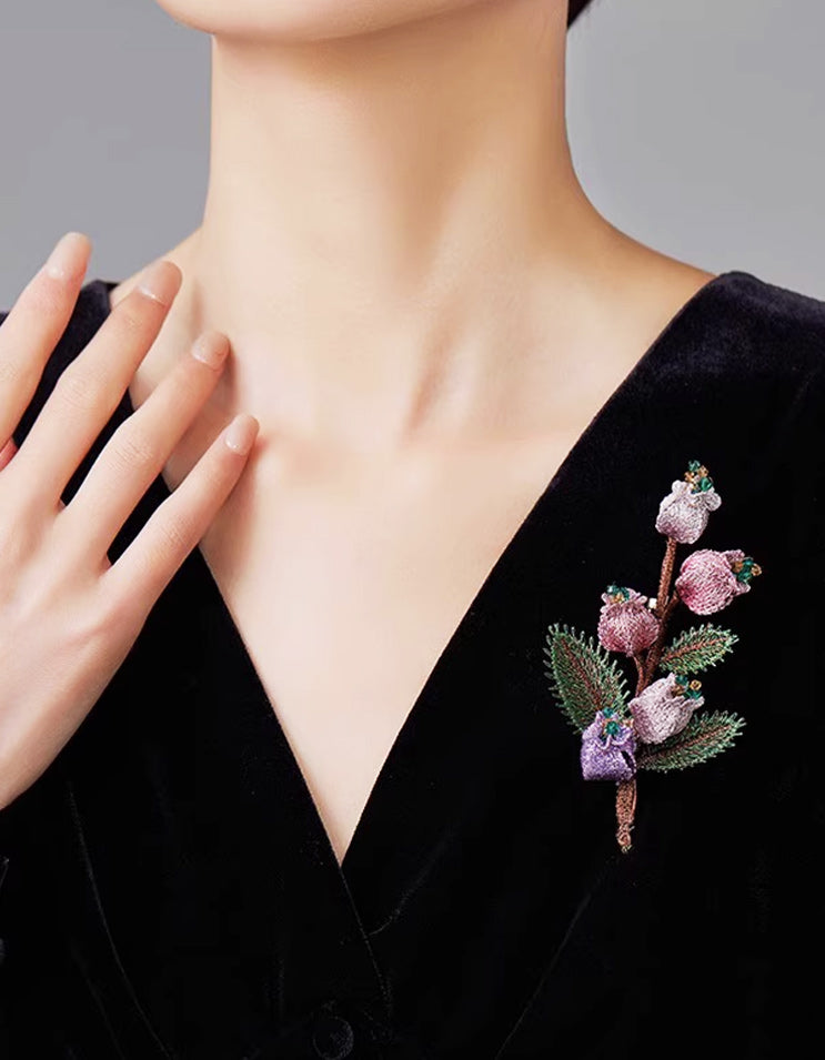 Model wearing the Bellflower Embroidered Brooch by ZolanJewelry, showcasing elegant handmade Chinese craftsmanship.
