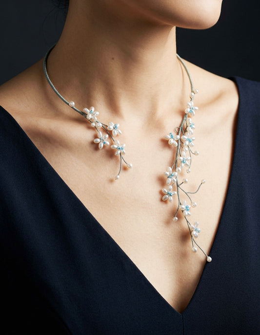 Model wearing pearl choker with high-collared cheongsam, expressing Song Dynasty-inspired grace and refinement