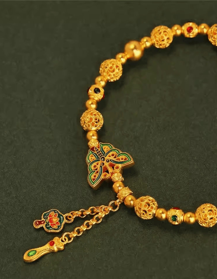 Handcrafted Filigree Enamel Bracelet Featuring a Golden Butterfly Design