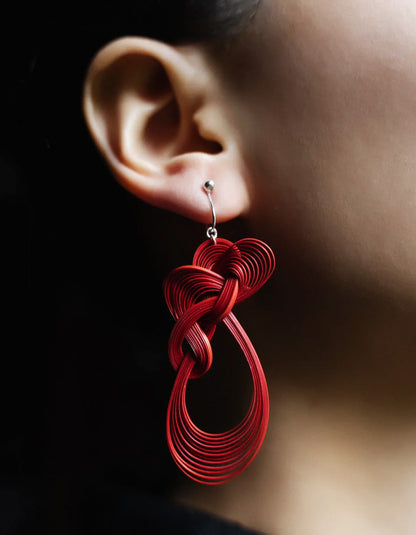 Artisan bamboo-woven earrings macro view