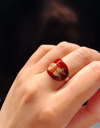 Model wearing the Red-Gold Maned Horse lacquer ring, highlighting its red-gold palette and contemporary Oriental jewelry aesthetic