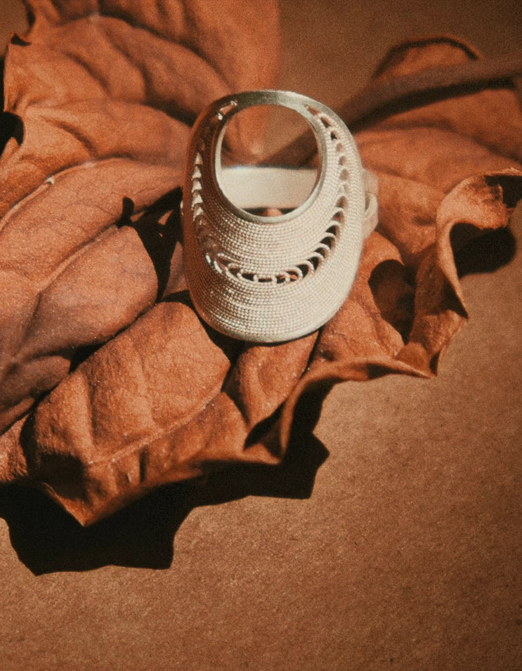 ZolanJewelry handcrafted Chinese silver filigree (Huasi Xiangqian) open statement ring. Architectural fine silver design inspired by fluid lunar arcs and Eastern art.