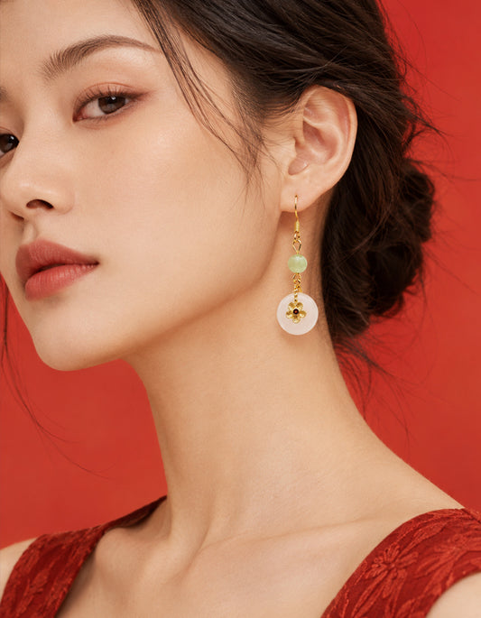 Model wearing Peaceful Circle natural chalcedony 925 silver gold-plated earrings by ZolanJewelry