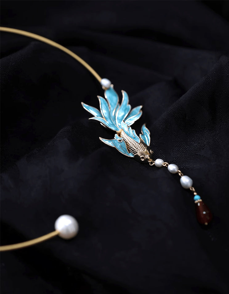 Handcrafted Chinese cloisonné enamel choker featuring the mythical peacock fish. Detailed with fine silver filigree threads and vibrant hand-fired glazes.