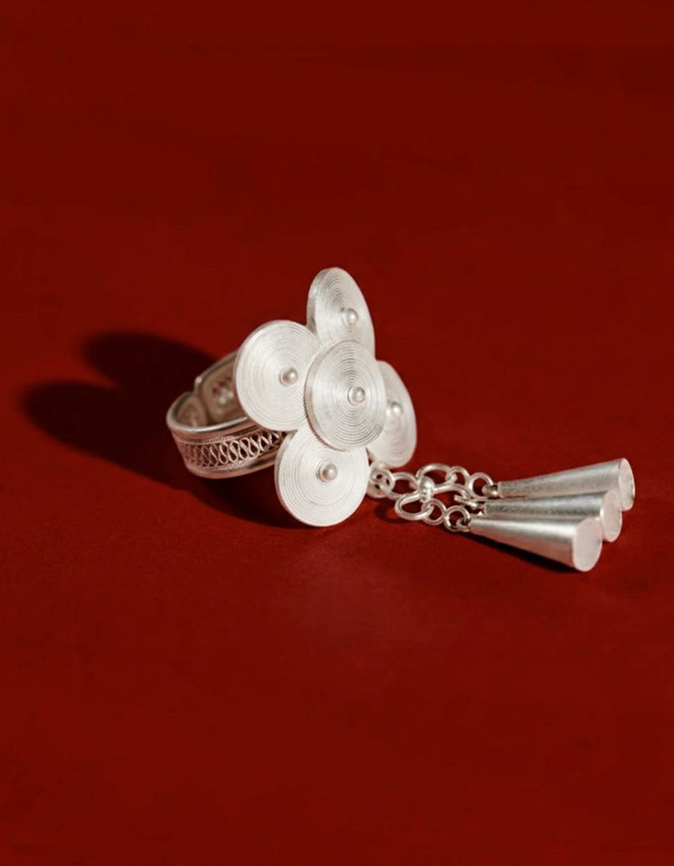 Zolan Jewelry Miao silver lotus ring with raw silk shawl, expressing feminine strength and ancestral charm