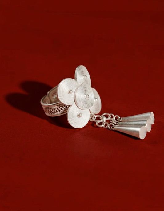 Zolan Jewelry Miao silver lotus ring with raw silk shawl, expressing feminine strength and ancestral charm