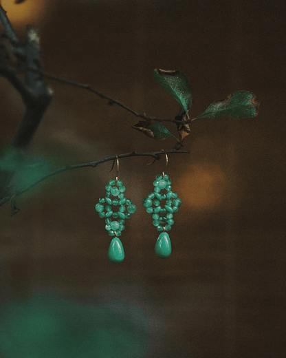 Detail shot of aventurine's crystalline inclusions and dew-like glow, evoking mountain forest serenity